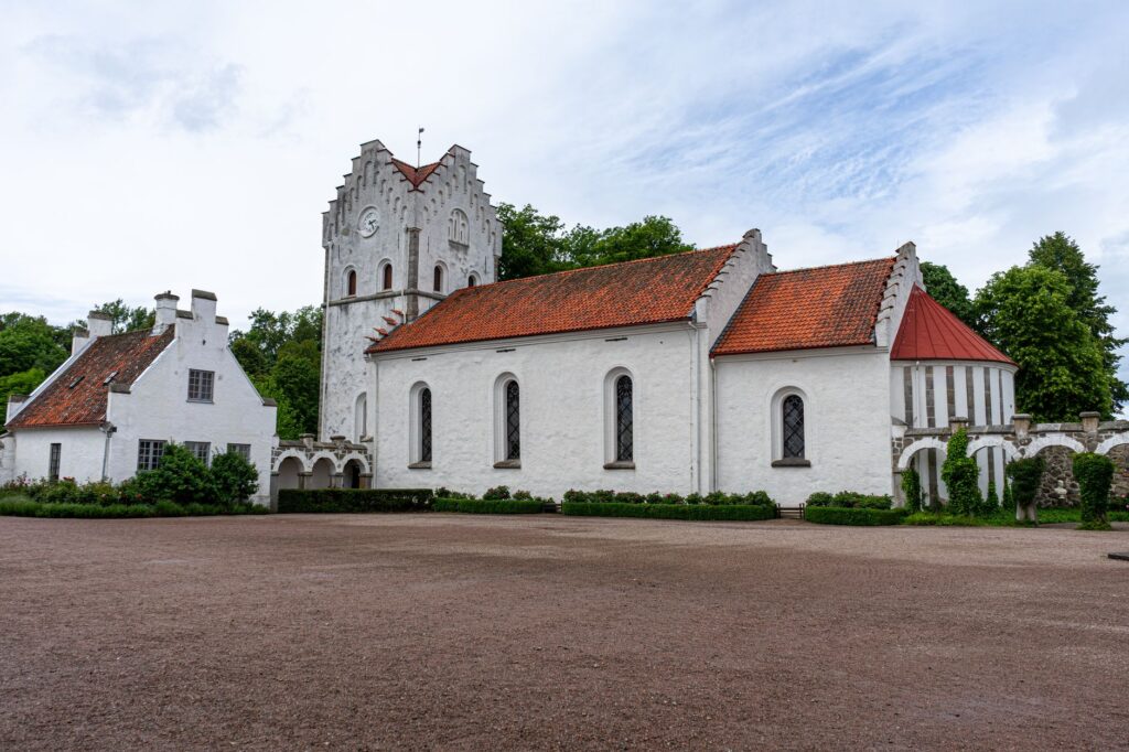Capture of the historic Bosjökloster Church exterior in Skåne, Sweden during summer. — opactwo w Jarosławiu