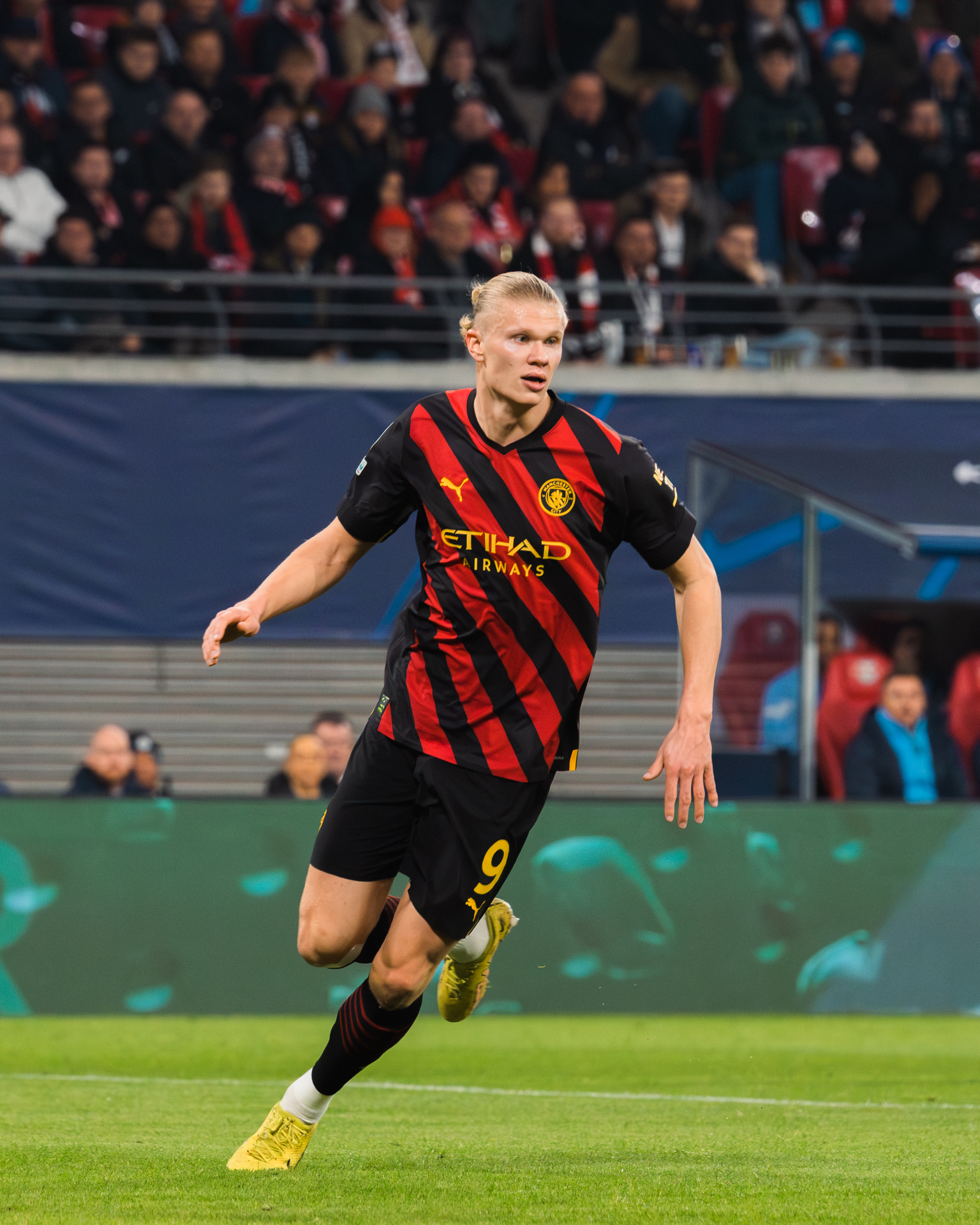 Erling Haaland playing for Manchester City against RB Leipzig in a UEFA Champions League match at the Red